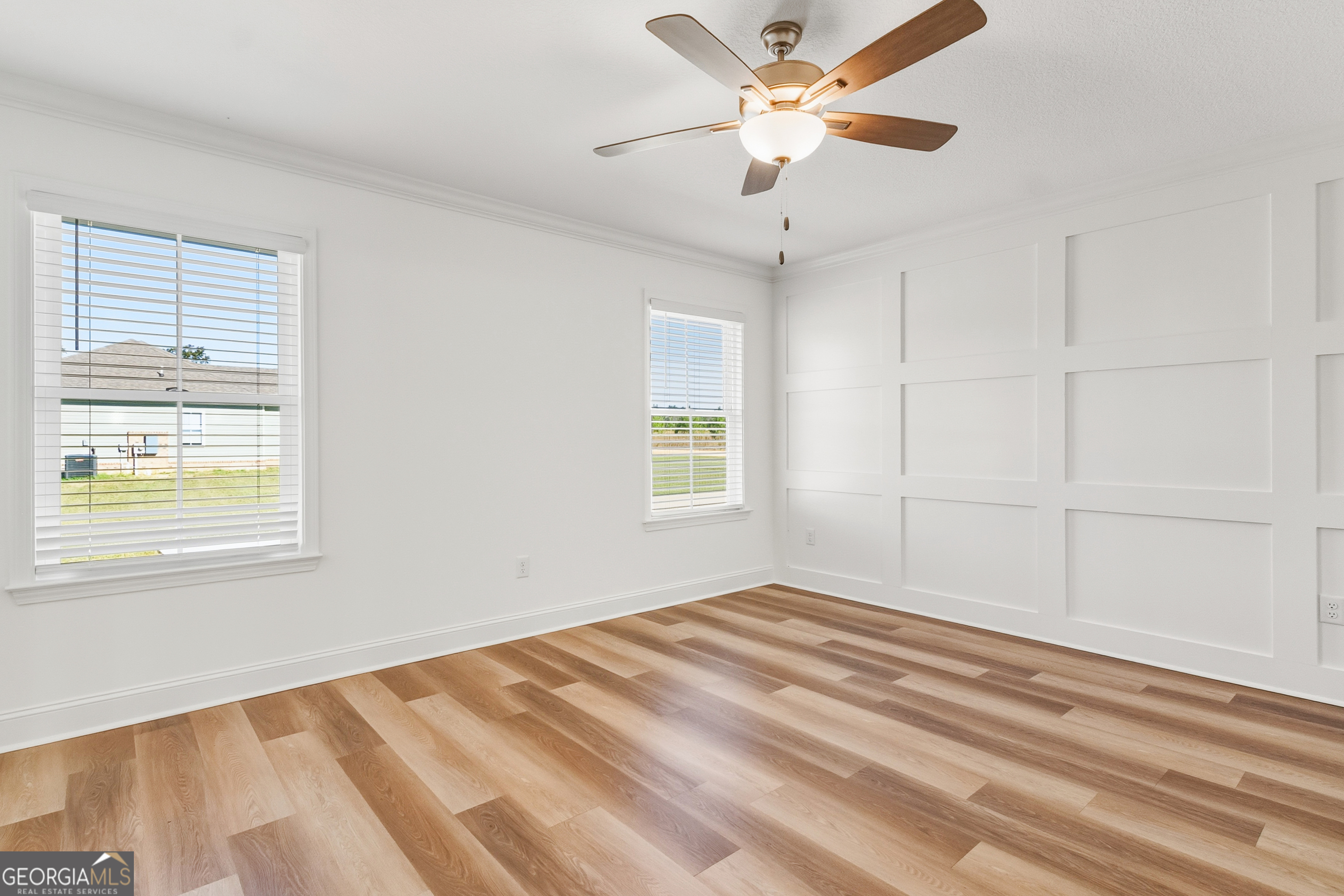 477 Jack Kennedy Road Statesboro, GA 30458 - Photo 16 of 32 a view of an empty room with a window