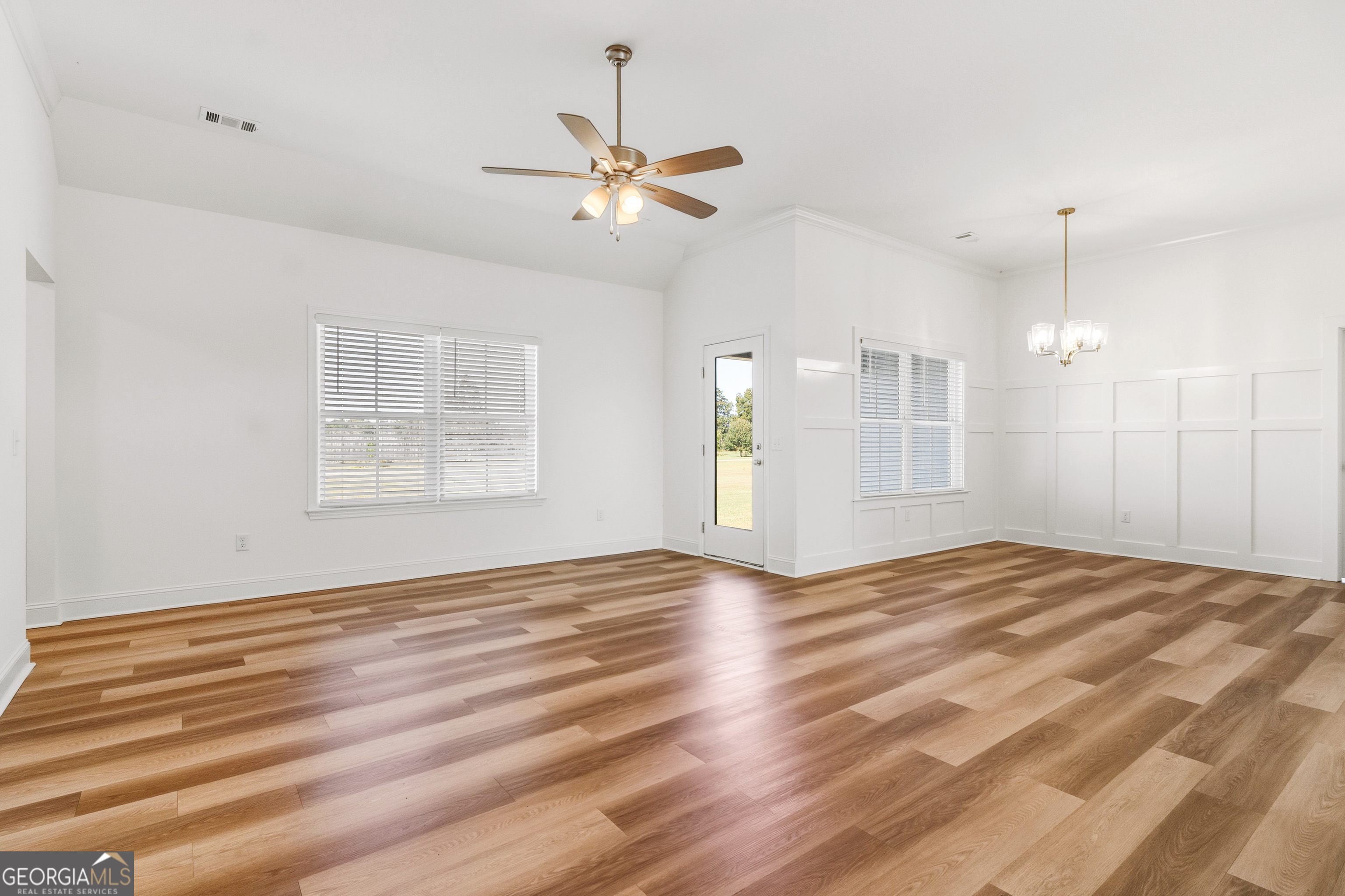 477 Jack Kennedy Road Statesboro, GA 30458 - Photo 5 of 32 a view of an empty room with a window