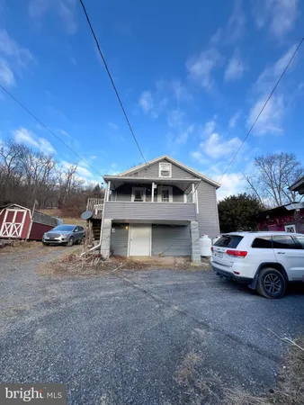 a car parked in front of a house