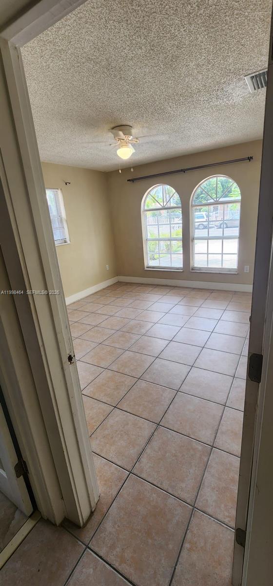 880 East 26th Street Hialeah, FL 33013 - Photo 14 of 34 a view of empty room with windows