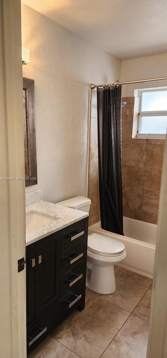 880 East 26th Street Hialeah, FL 33013 - Photo 25 of 34 a bathroom with a sink toilet and shower