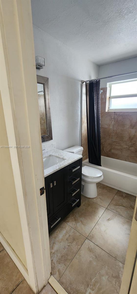 880 East 26th Street Hialeah, FL 33013 - Photo 32 of 34 a bathroom with a sink a toilet and shower