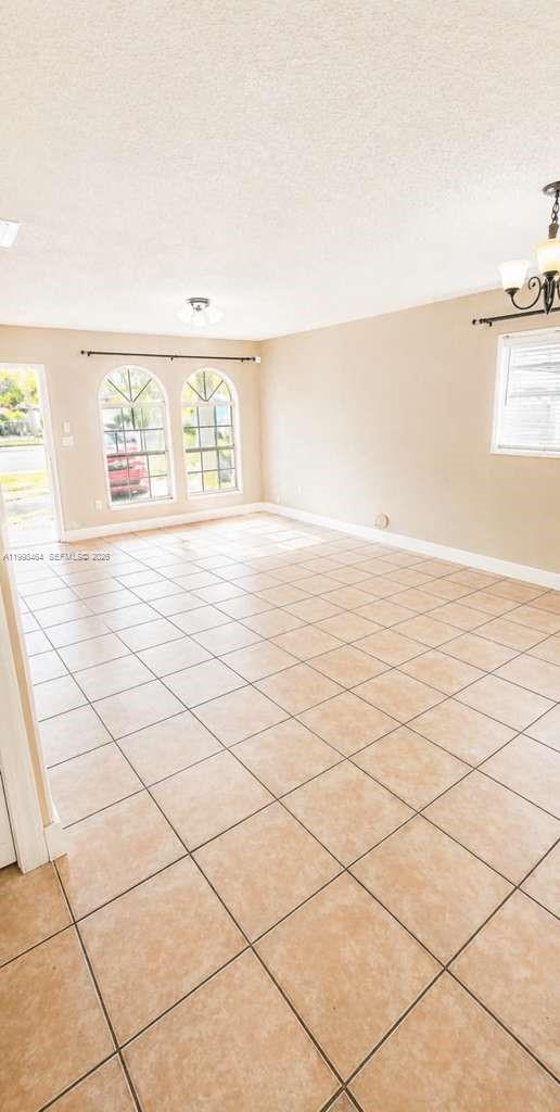 880 East 26th Street Hialeah, FL 33013 - Photo 5 of 34 a view of an empty room and window