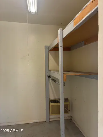 a bathroom with a glass door