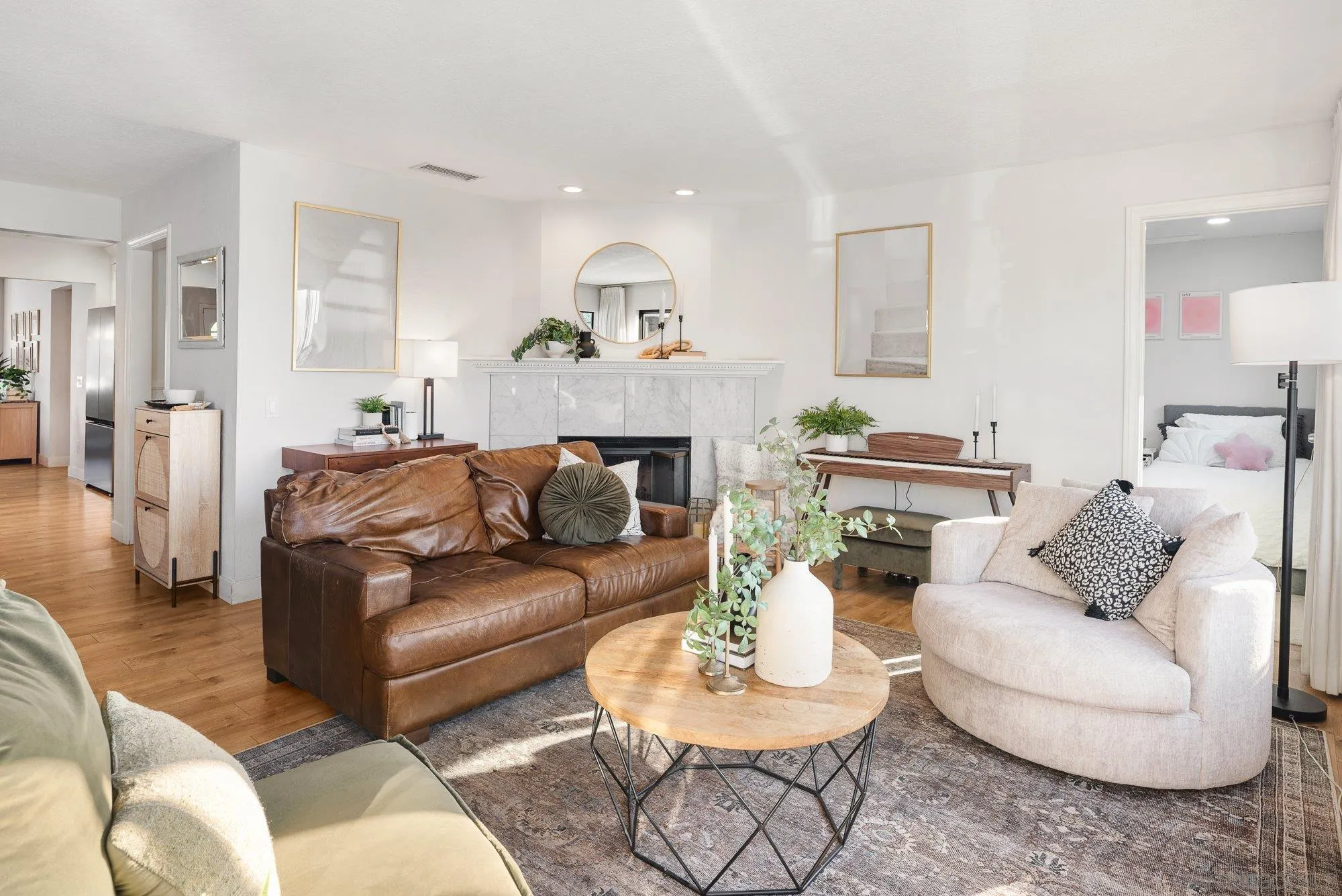 3491 Shawnee Road San Diego, CA 92117 - Photo 12 of 66 a living room with furniture and a wooden floor