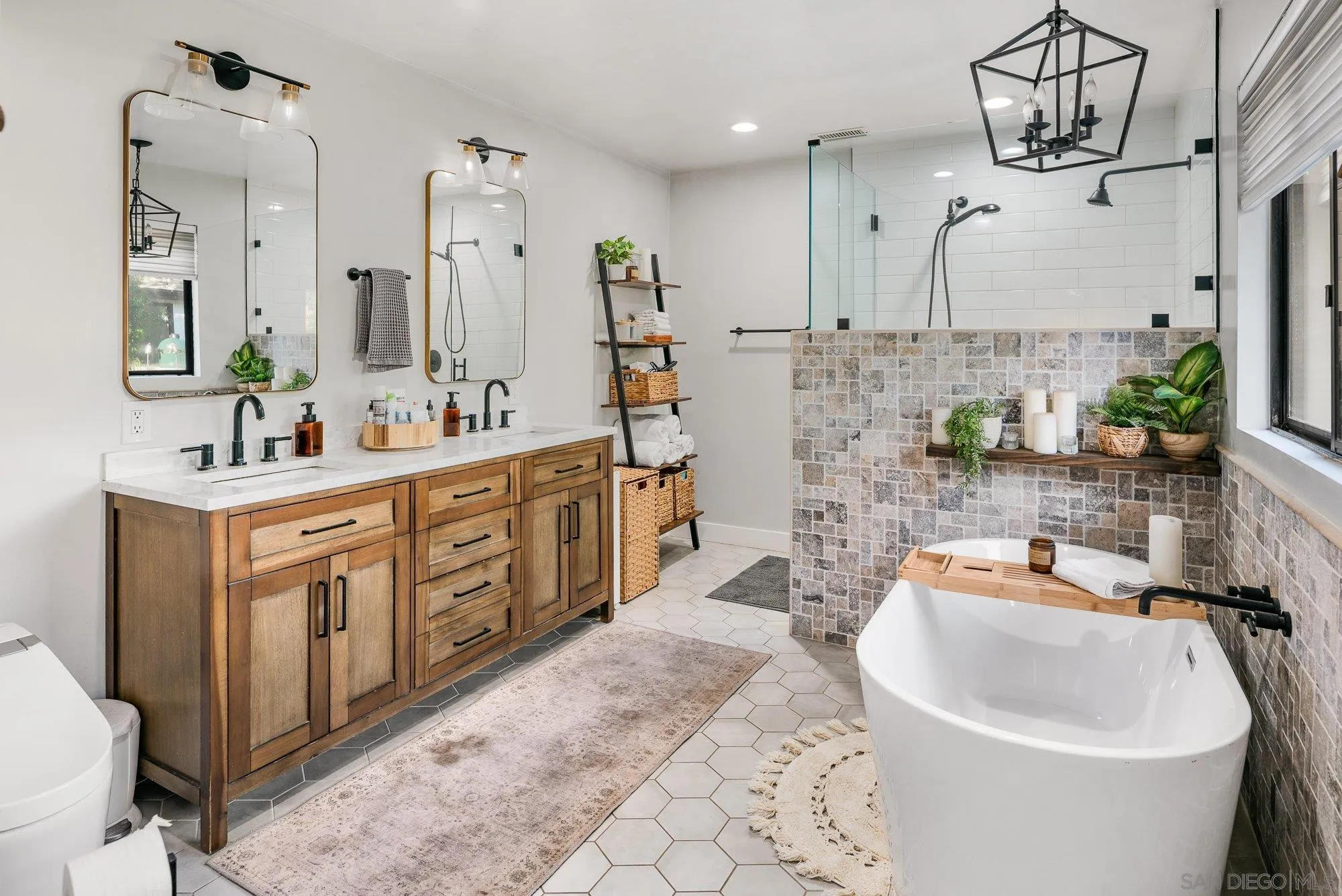 3491 Shawnee Road San Diego, CA 92117 - Photo 28 of 66 a large white bathroom with a double vanity sink a mirror and a
