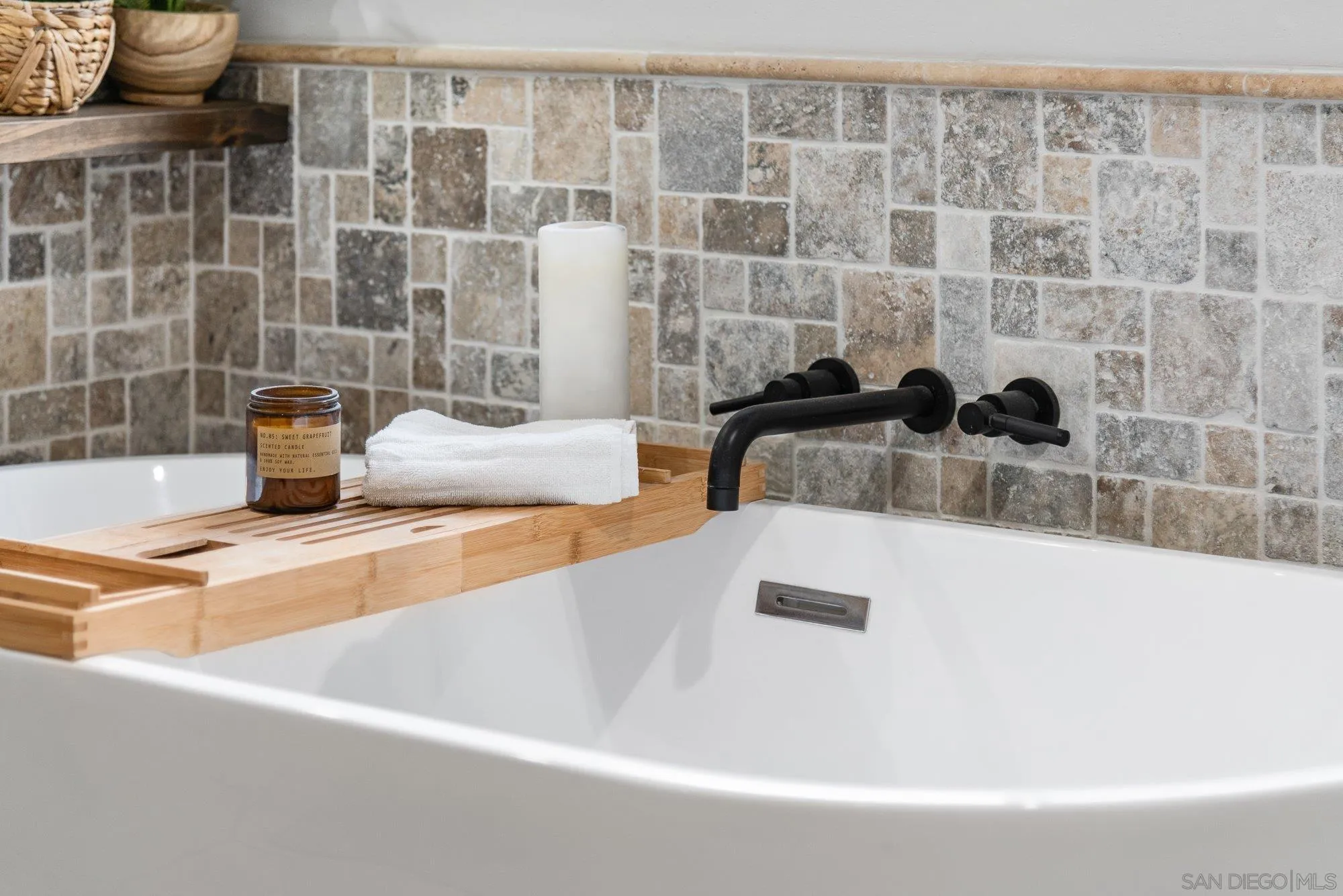 3491 Shawnee Road San Diego, CA 92117 - Photo 30 of 66 a bathroom with a granite countertop sink and a bathtub