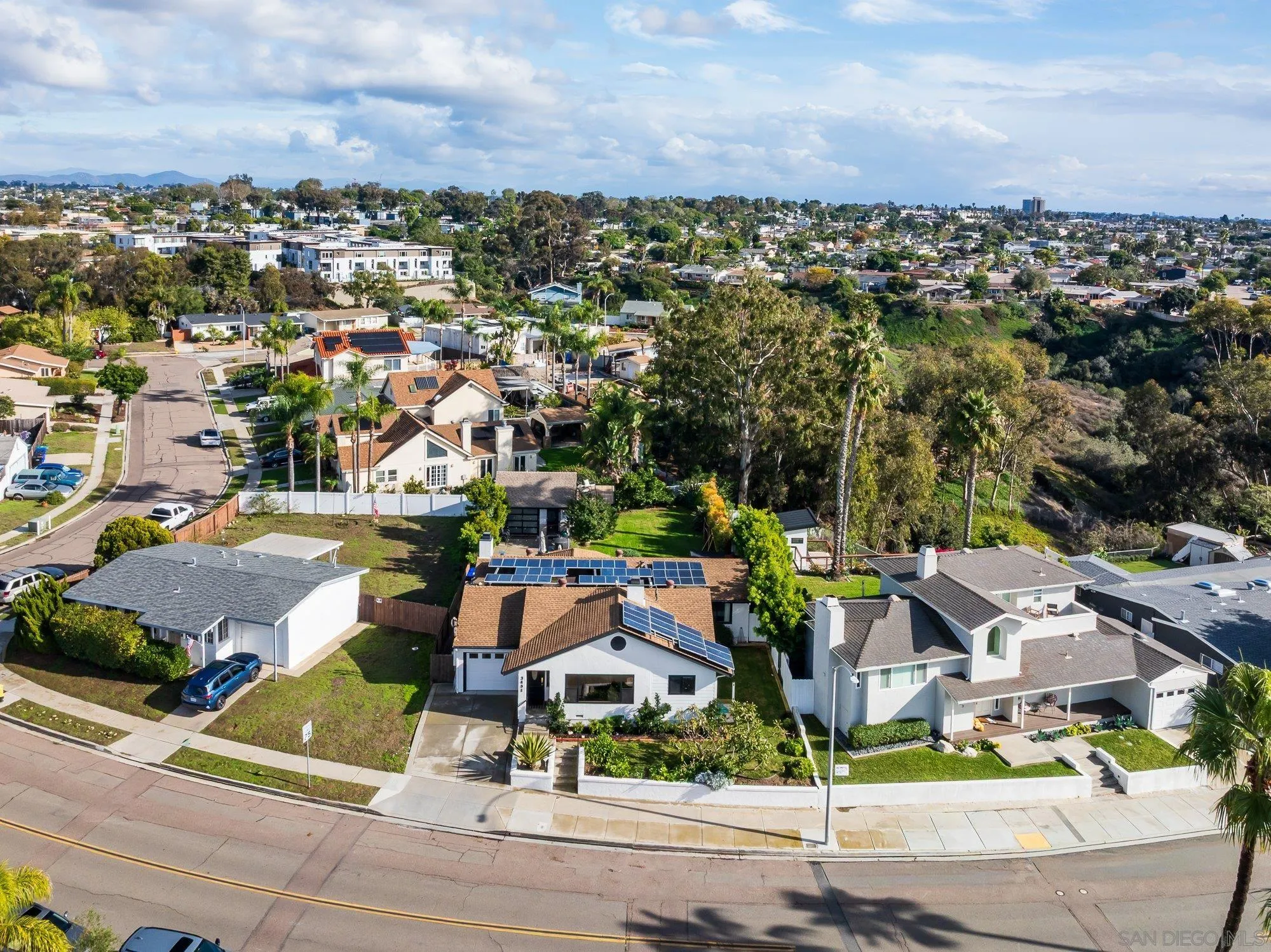3491 Shawnee Road San Diego, CA 92117 - Photo 3 of 66 an aerial view of residential houses with city view