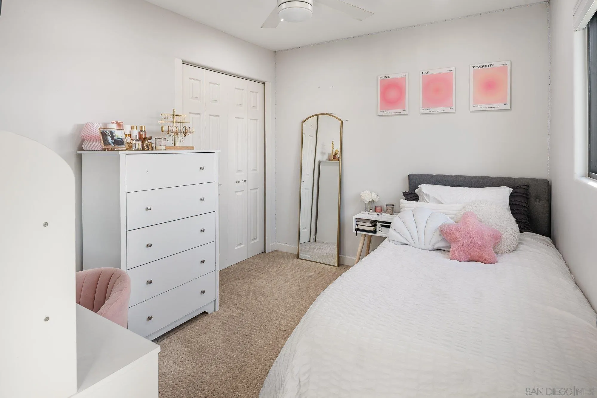 3491 Shawnee Road San Diego, CA 92117 - Photo 36 of 66 a bedroom with a bed and a dresser