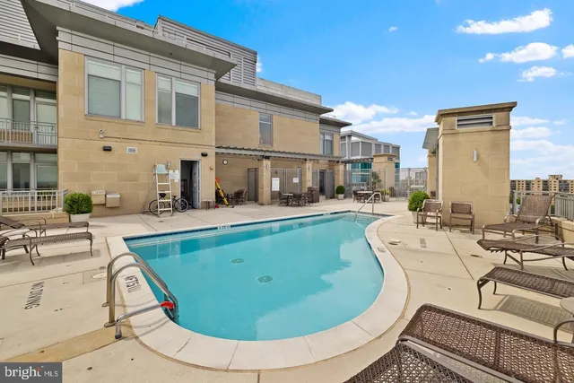 a view of a terrace with furniture and a table