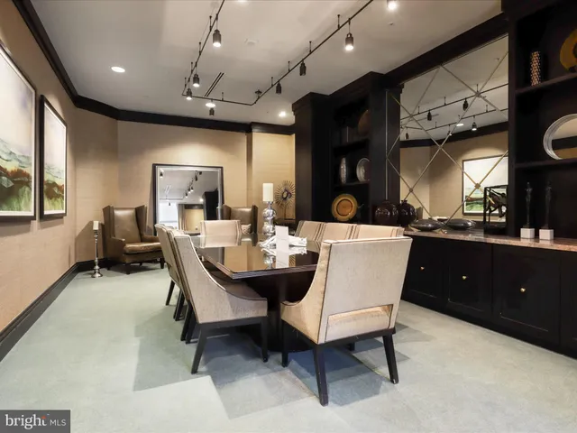 a view of a backyard with sitting area