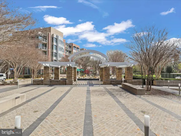 a sign that is sitting on a wall