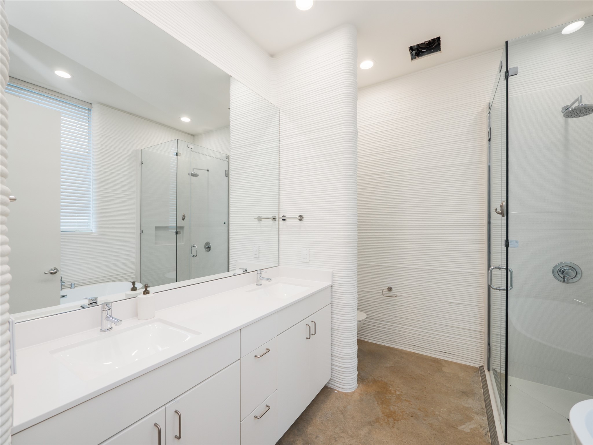 304 Painted Sunset Drive Georgetown, TX 78628 - Photo 17 of 38 a spacious bathroom with a shower sink mirror and toilet