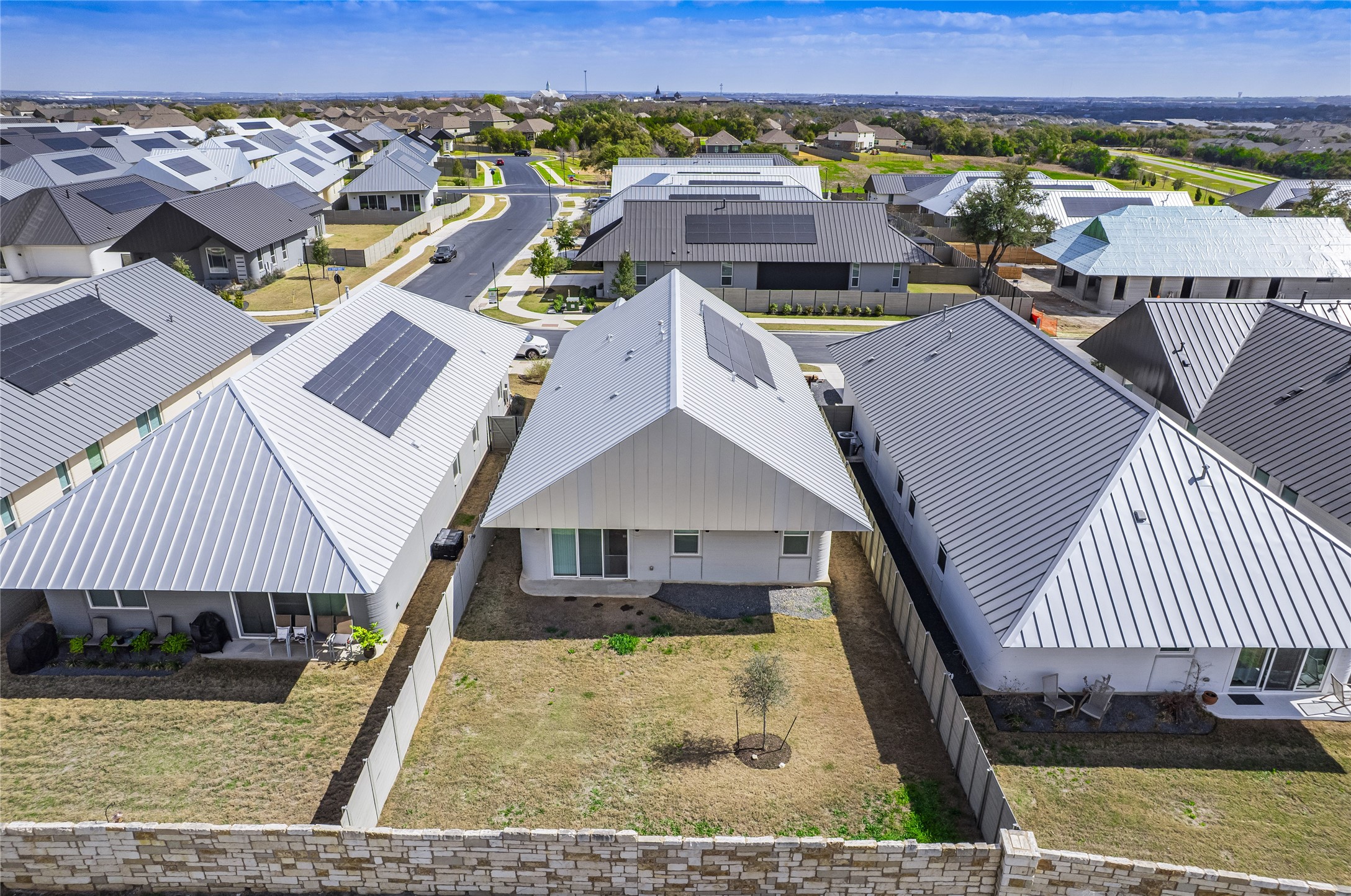 304 Painted Sunset Drive Georgetown, TX 78628 - Photo 31 of 38 an aerial view of a house with a garden
