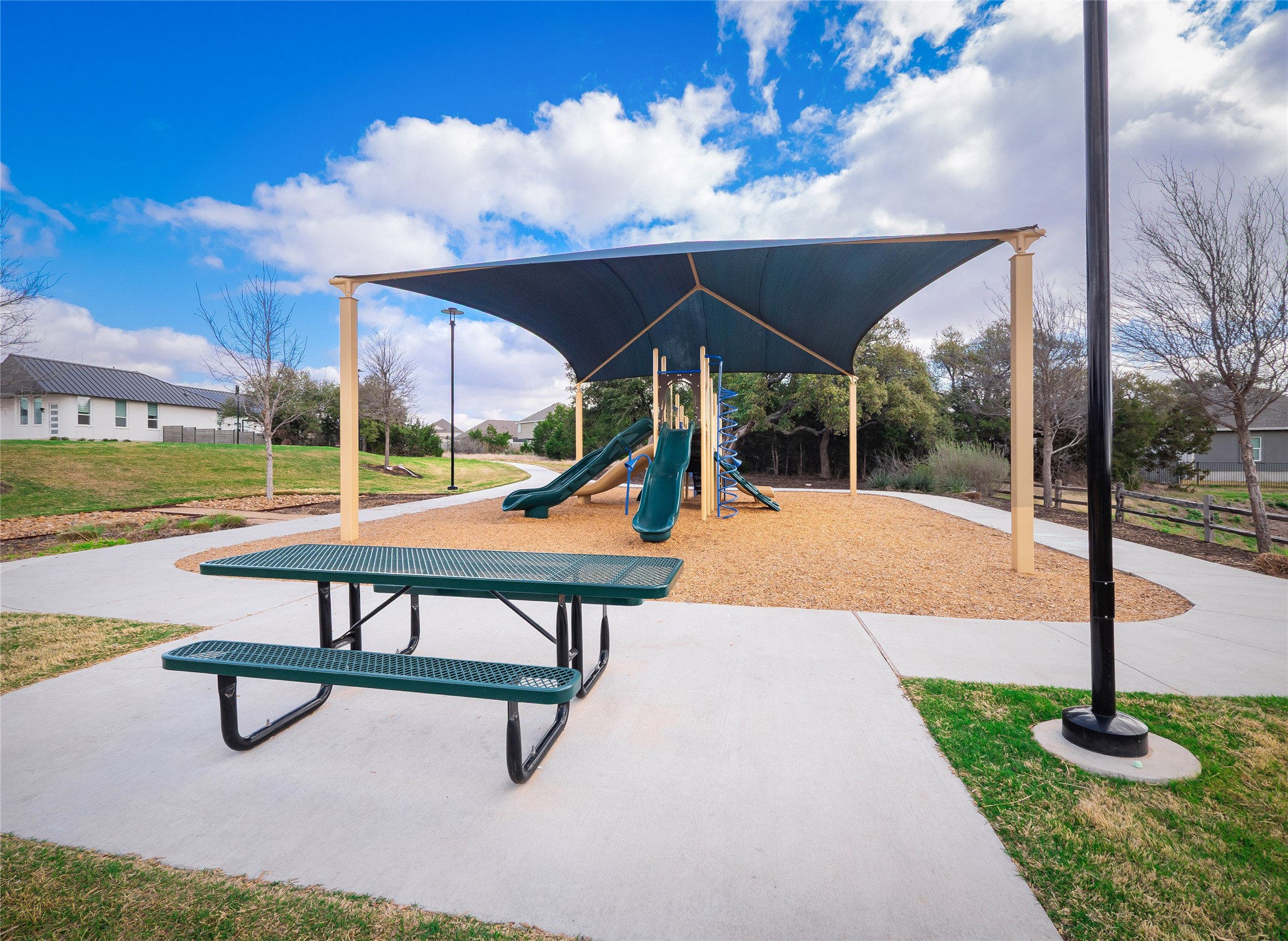 304 Painted Sunset Drive Georgetown, TX 78628 - Photo 35 of 38 a view of a park with slide