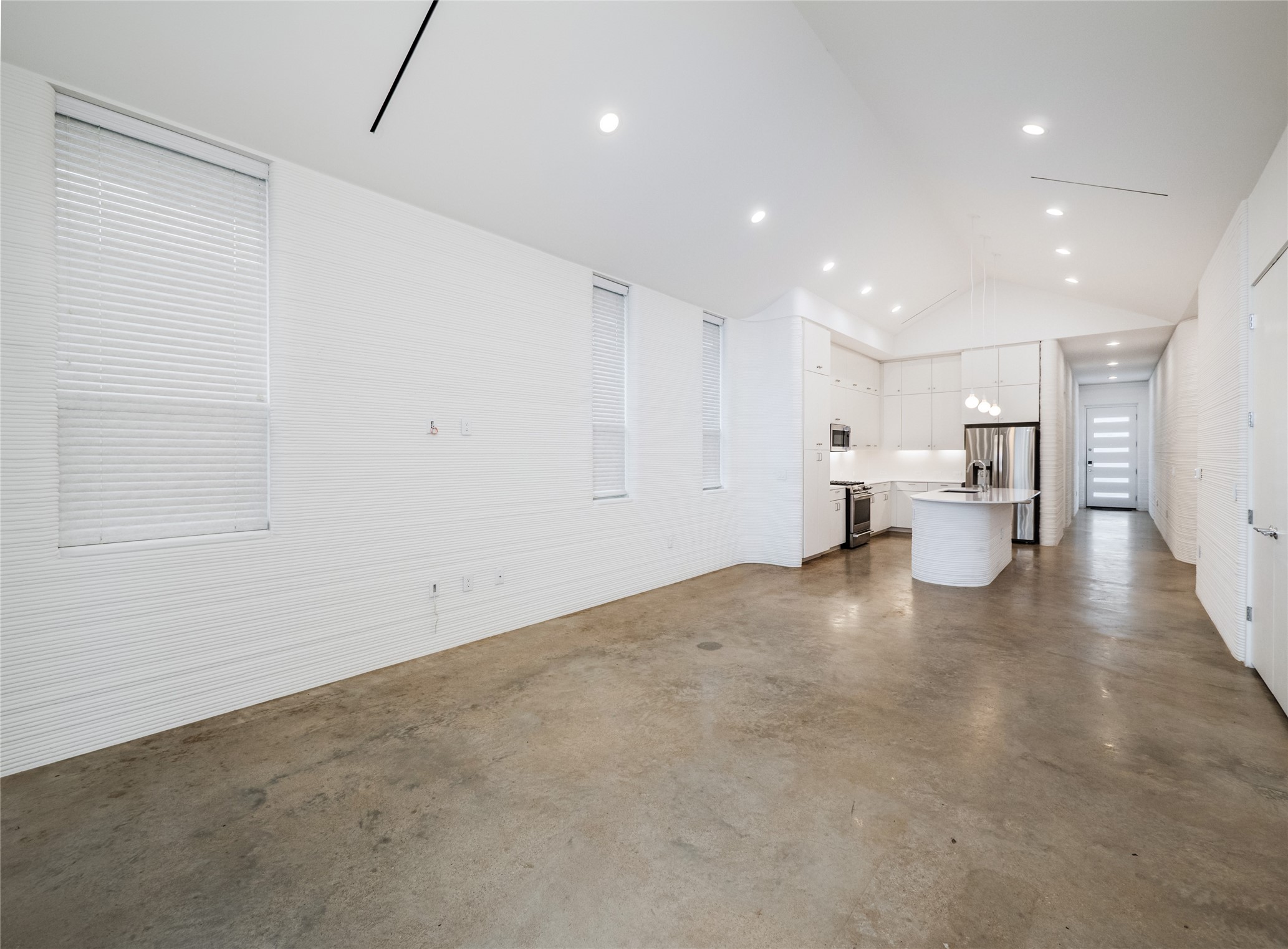 304 Painted Sunset Drive Georgetown, TX 78628 - Photo 7 of 38 a view of a kitchen with a lot of white cabinets