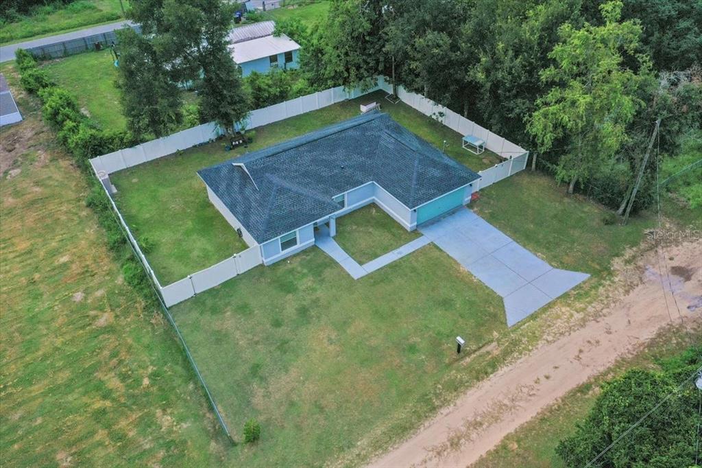 8890 Southwest 33rd Court Ocala, FL 34476 - Photo 52 of 58 an aerial view of a house