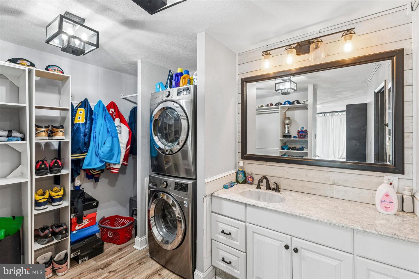 3900-00 West Ford Road, Unit 14K Philadelphia, PA 19131 - Photo 14 of 42 Stylish laundry nook with modern flair.