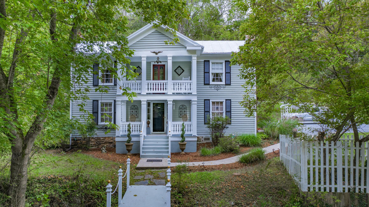 492 Greenhouse Road Lexington, VA 24450 - Photo 2 of 27 a front view of a house with a yard