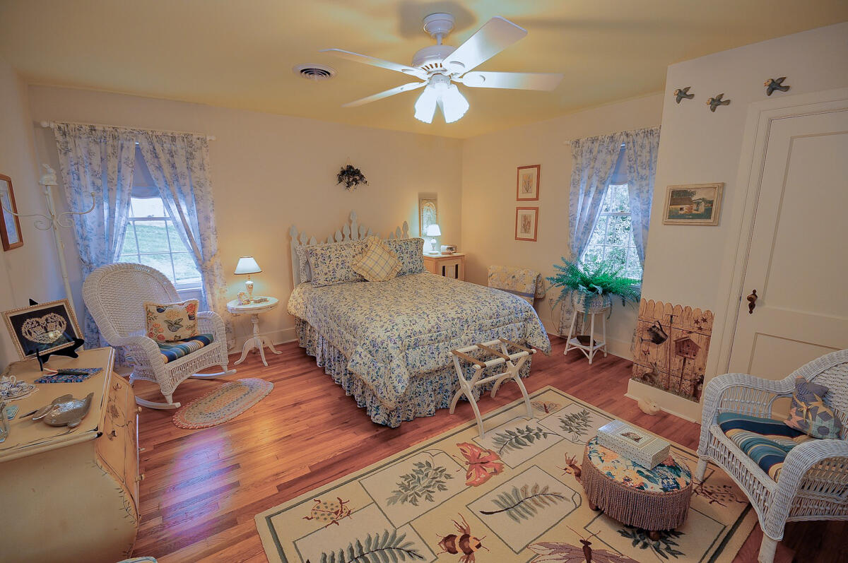 492 Greenhouse Road Lexington, VA 24450 - Photo 19 of 27 a living room with furniture and a chandelier