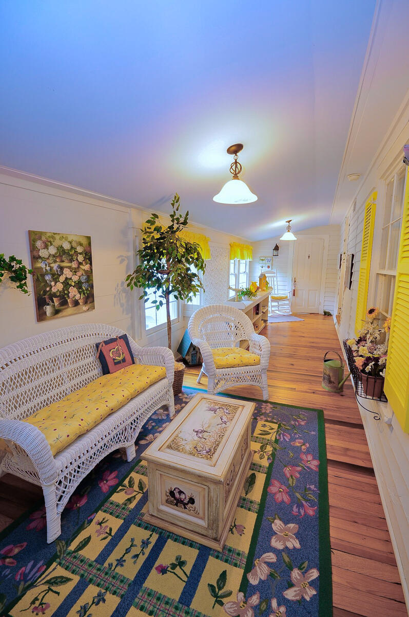 492 Greenhouse Road Lexington, VA 24450 - Photo 23 of 27 a bed room with a bed and a table