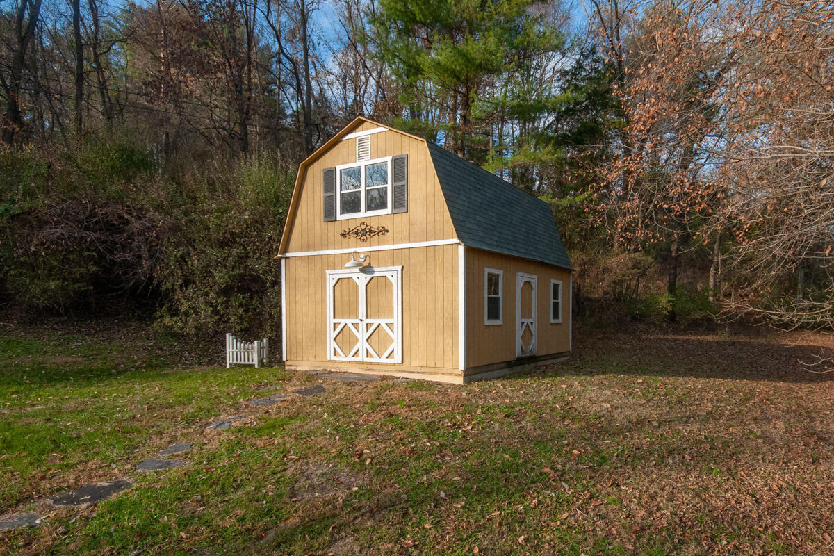 492 Greenhouse Road Lexington, VA 24450 - Photo 24 of 27 a front view of a house with a yard
