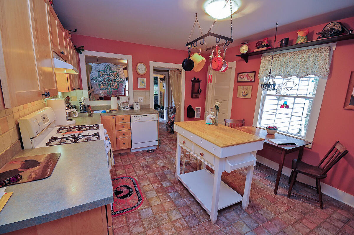 492 Greenhouse Road Lexington, VA 24450 - Photo 9 of 27 a living room with furniture and a chandelier