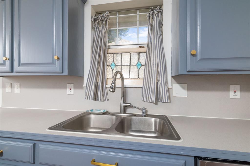 1908 Monte Cristo Drive Sherman, TX 75092 - Photo 13 of 38 a sink and a window