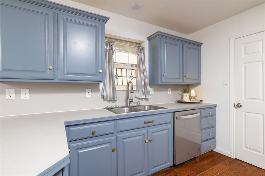 1908 Monte Cristo Drive Sherman, TX 75092 - Photo 14 of 38 a kitchen with a sink cabinets and window