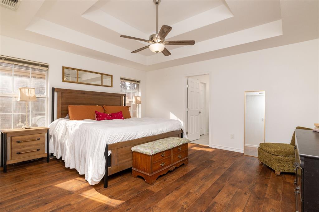 1908 Monte Cristo Drive Sherman, TX 75092 - Photo 19 of 38 a bedroom with a bed and window