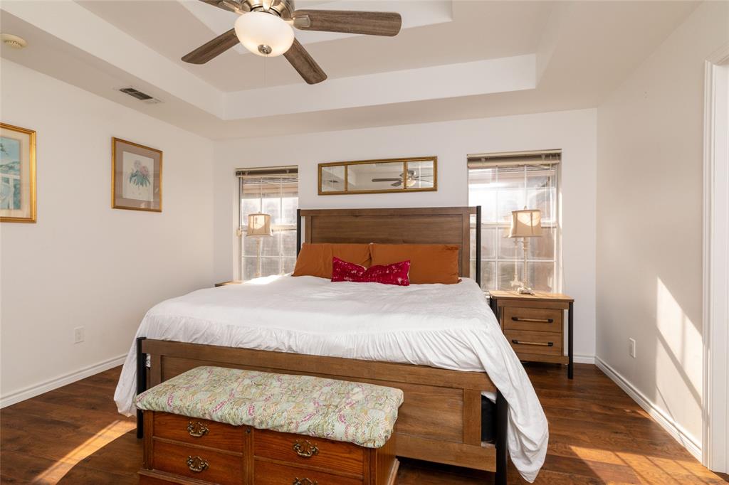 1908 Monte Cristo Drive Sherman, TX 75092 - Photo 20 of 38 a bedroom with a bed and window
