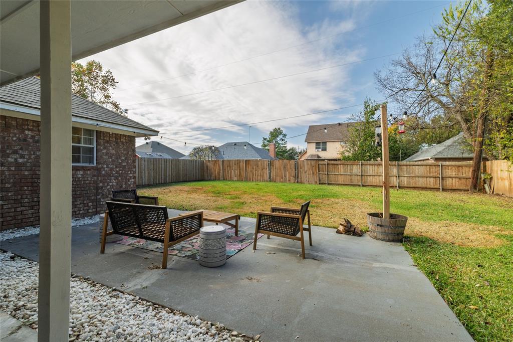 1908 Monte Cristo Drive Sherman, TX 75092 - Photo 29 of 38 a view of a yard with furniture