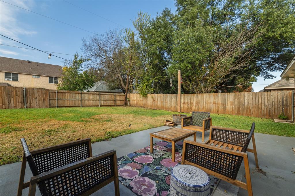 1908 Monte Cristo Drive Sherman, TX 75092 - Photo 30 of 38 a view of a yard with furniture and a backyard