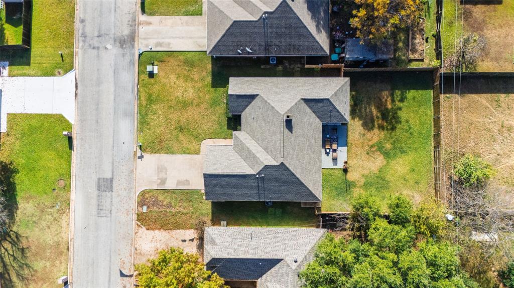 1908 Monte Cristo Drive Sherman, TX 75092 - Photo 36 of 38 a aerial view of a house with a yard