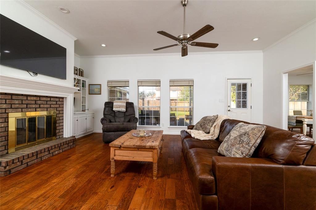 1908 Monte Cristo Drive Sherman, TX 75092 - Photo 6 of 38 a living room with furniture and a fireplace