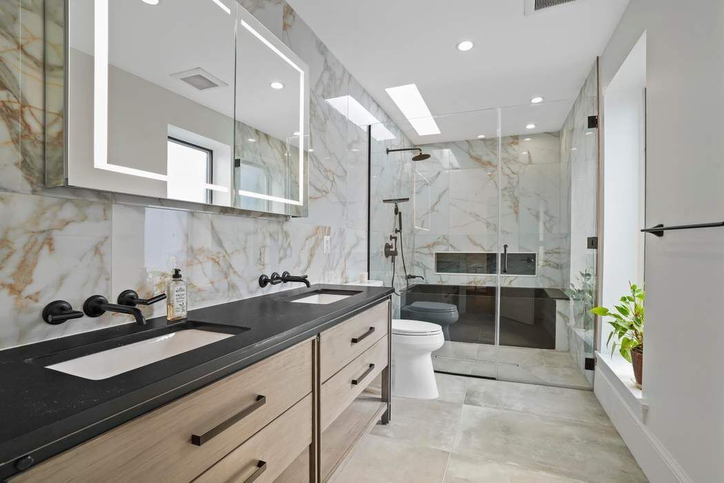 682 Madison Street Brooklyn, NY 11221 - Photo 11 of 28 a kitchen with a sink and cabinets