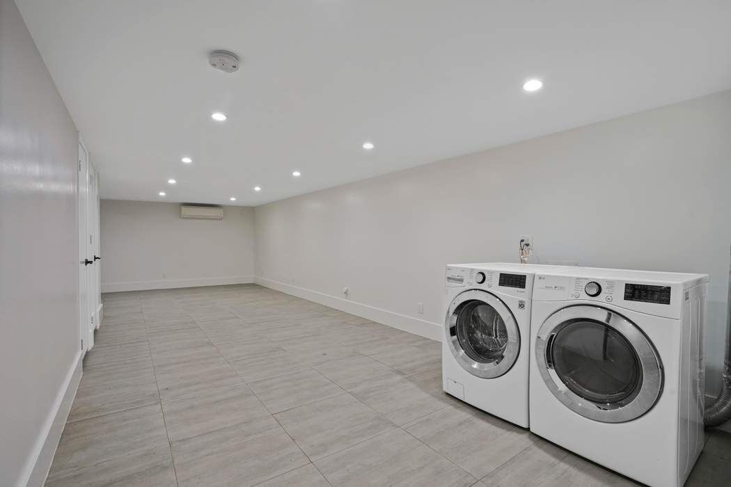 682 Madison Street Brooklyn, NY 11221 - Photo 15 of 28 a view of utility room with washer and dryer
