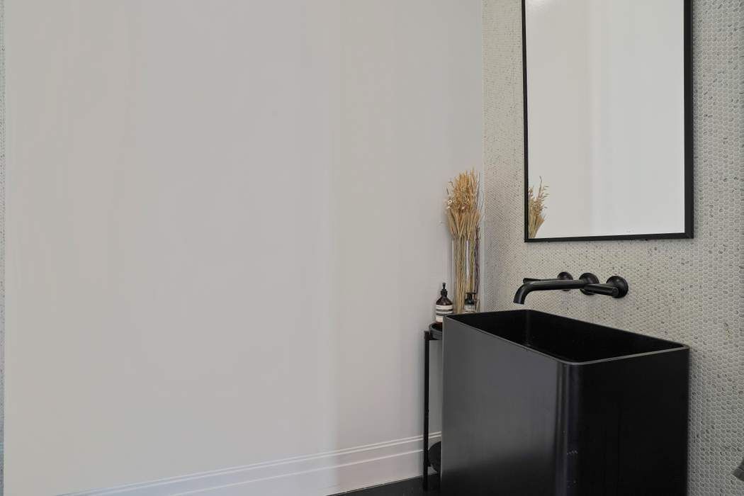 682 Madison Street Brooklyn, NY 11221 - Photo 8 of 28 a bathroom with a sink and a mirror