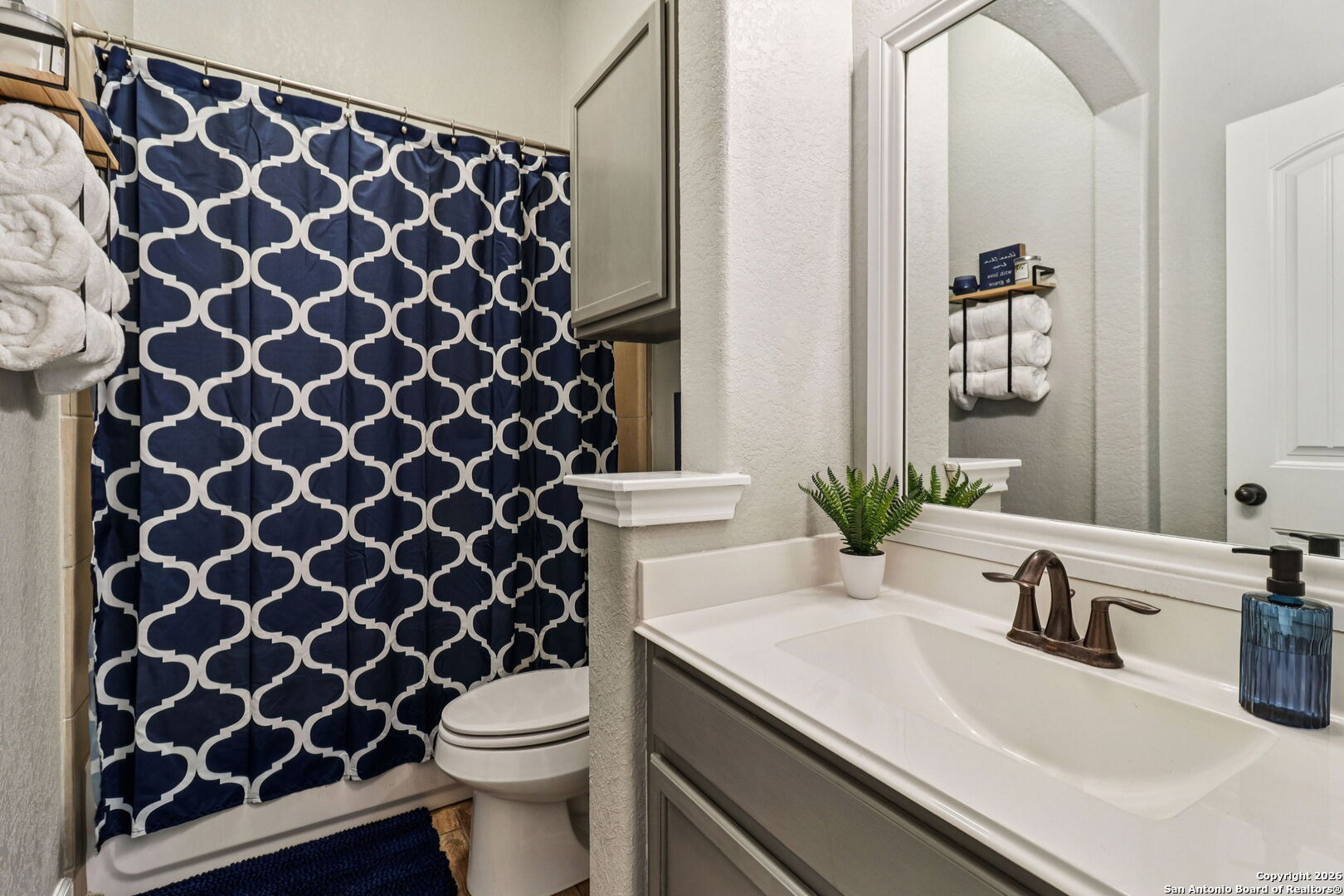 1074 Boulder New Braunfels, TX 78132 - Photo 20 of 40 a bathroom with a sink and a toilet