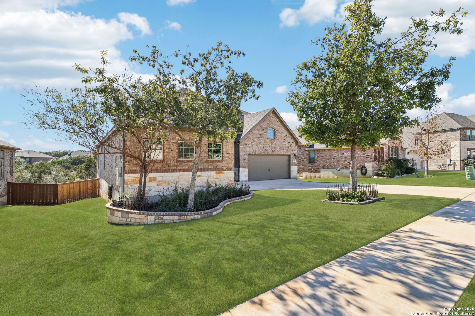 1074 Boulder New Braunfels, TX 78132 - Photo 2 of 40 a front view of a house with garden