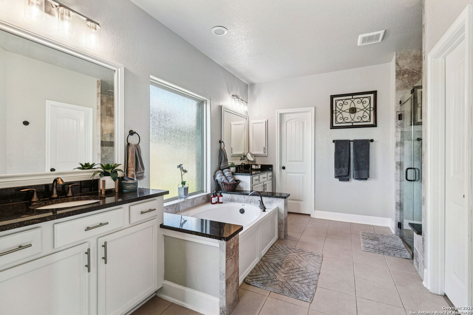 1074 Boulder New Braunfels, TX 78132 - Photo 25 of 40 a kitchen with a sink and cabinets