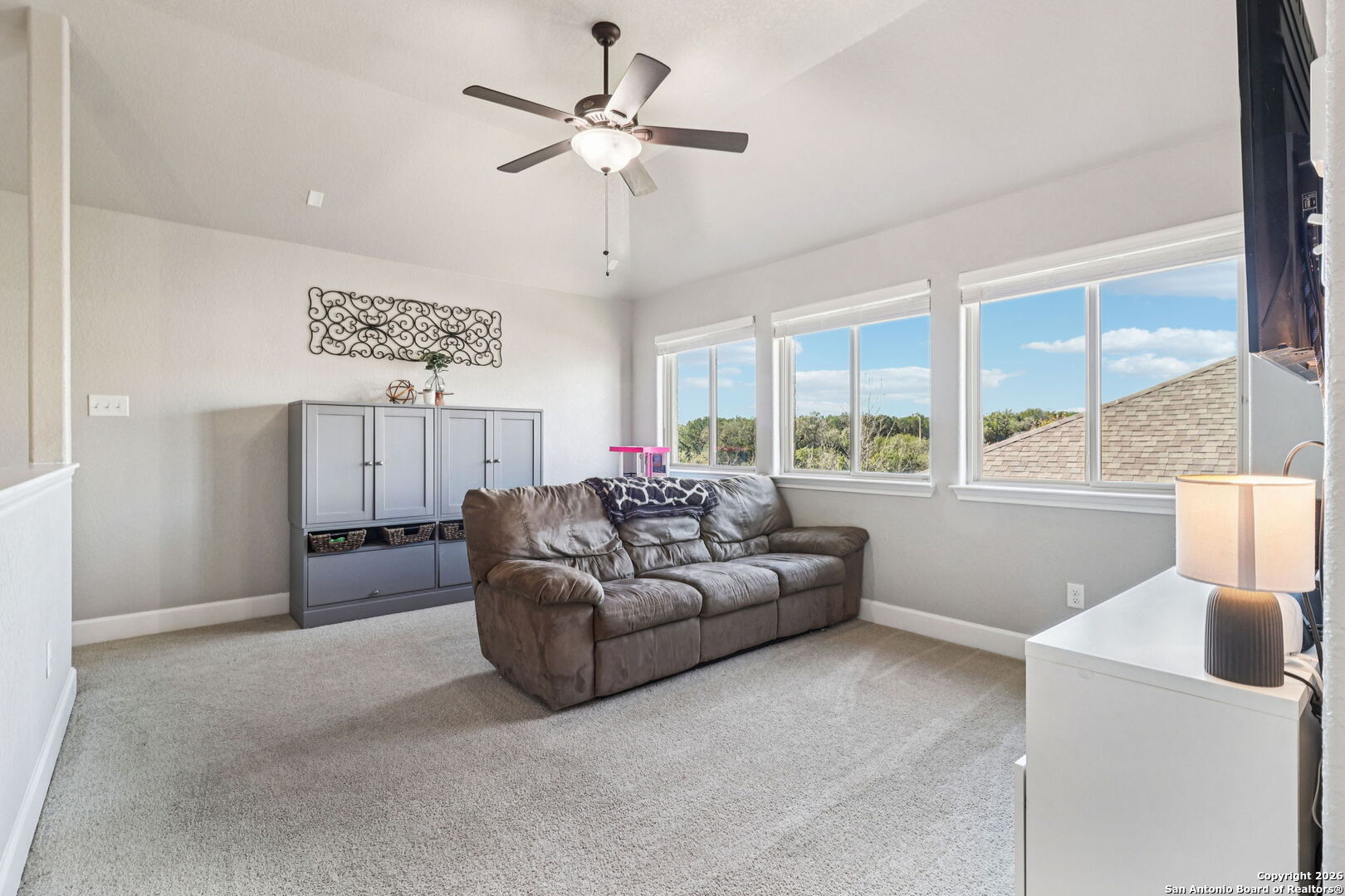 1074 Boulder New Braunfels, TX 78132 - Photo 28 of 40 a living room with furniture and a large window