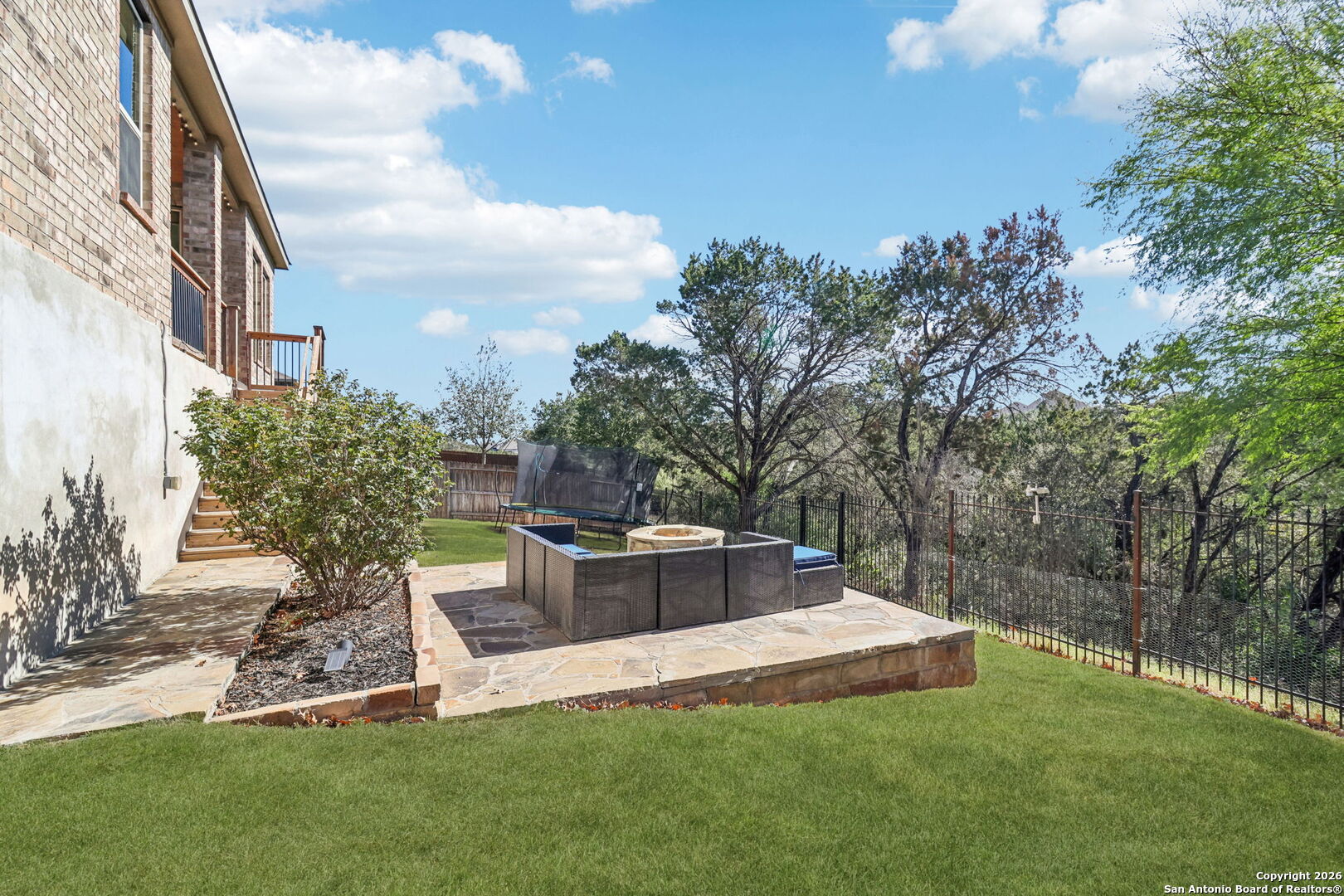 1074 Boulder New Braunfels, TX 78132 - Photo 34 of 40 a view of a garden with a fountain