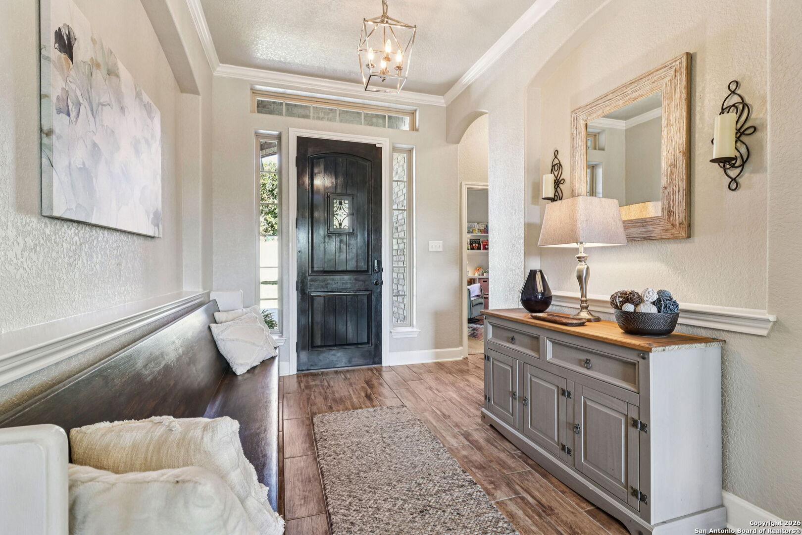 1074 Boulder New Braunfels, TX 78132 - Photo 4 of 40 a living room with furniture and a chandelier