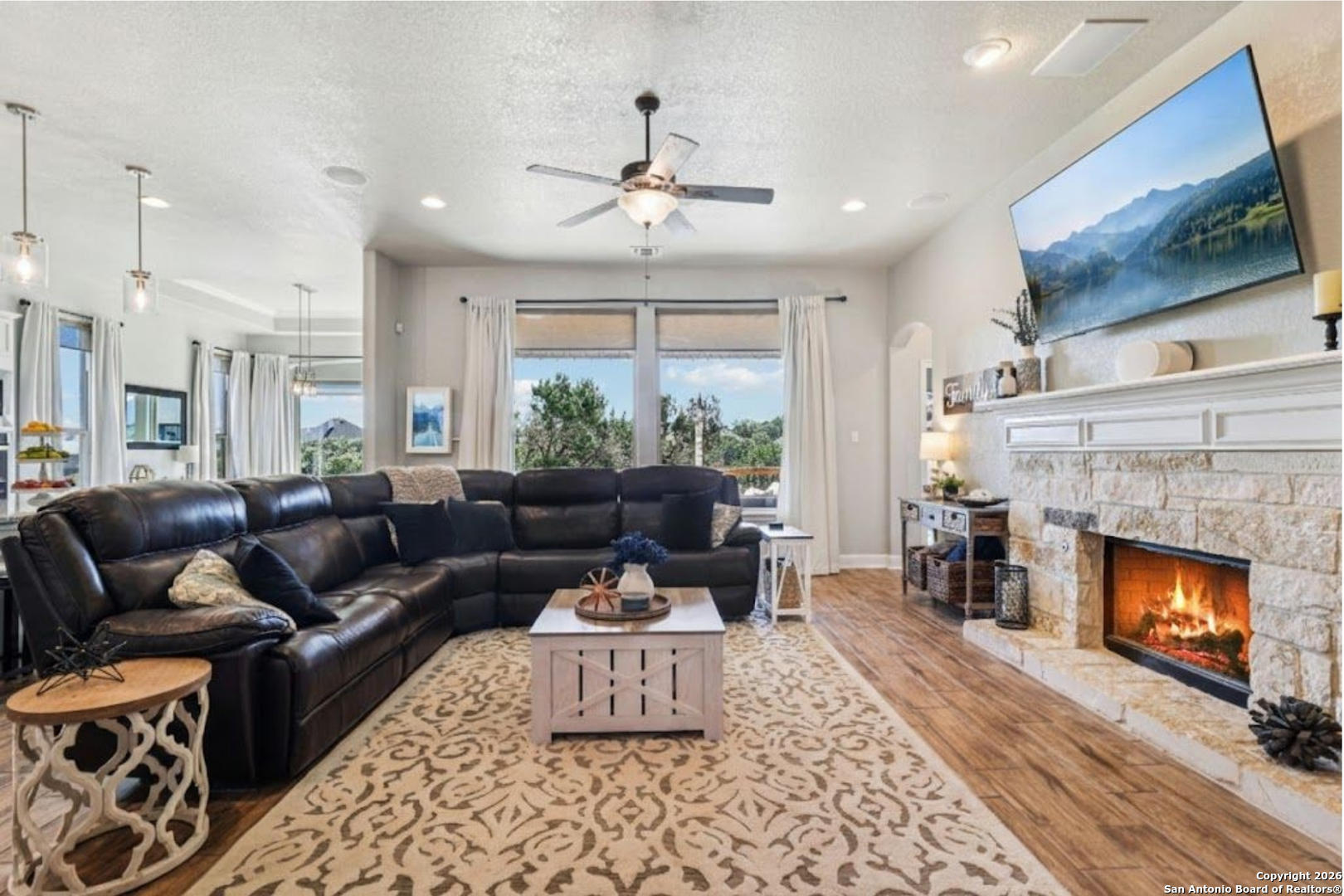 1074 Boulder New Braunfels, TX 78132 - Photo 9 of 40 a living room with furniture and a fireplace