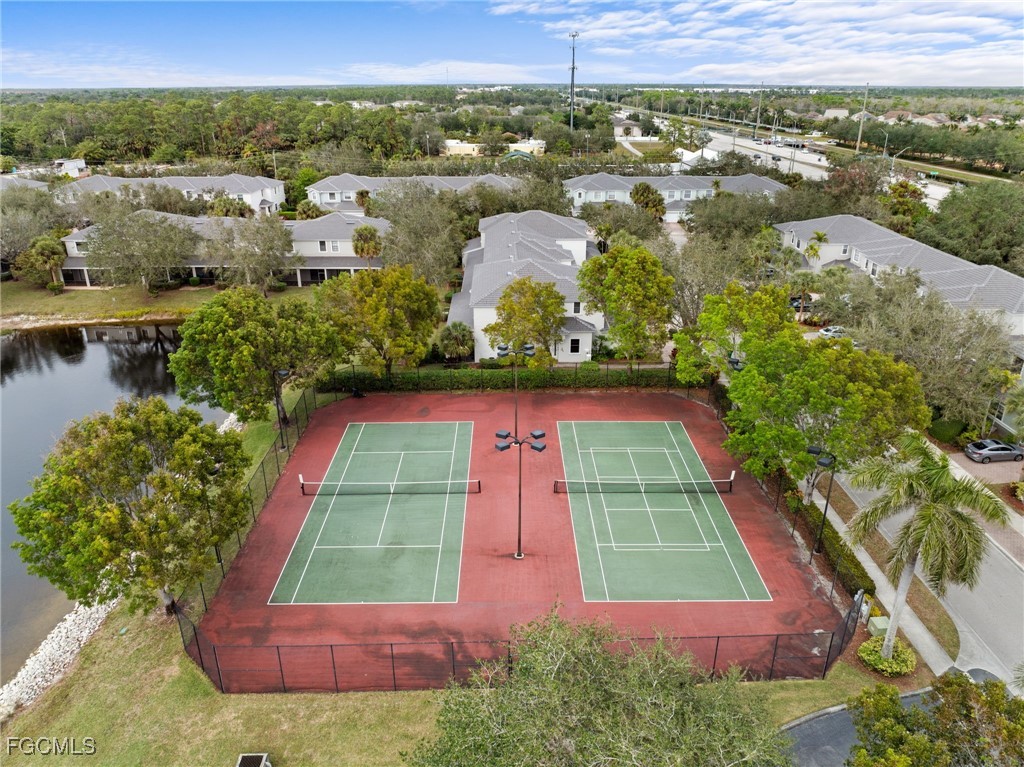 14764 Pinnacle Place, Unit 65 Naples, FL 34119 - Photo 46 of 50 an aerial view of a yard