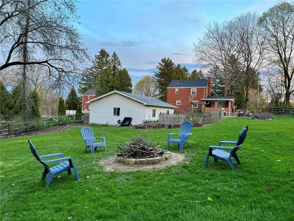 8263 Peebles Road Pittsburgh, PA 15237 - Photo 32 of 49 a view of a house with a yard porch and sitting area