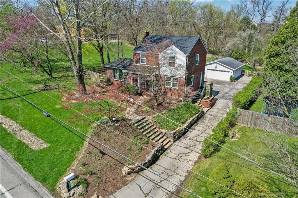 8263 Peebles Road Pittsburgh, PA 15237 - Photo 49 of 49 a front view of a house with garden