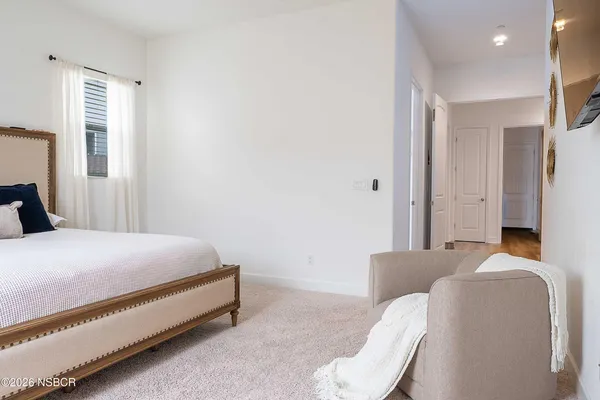 a view of a closet with storage