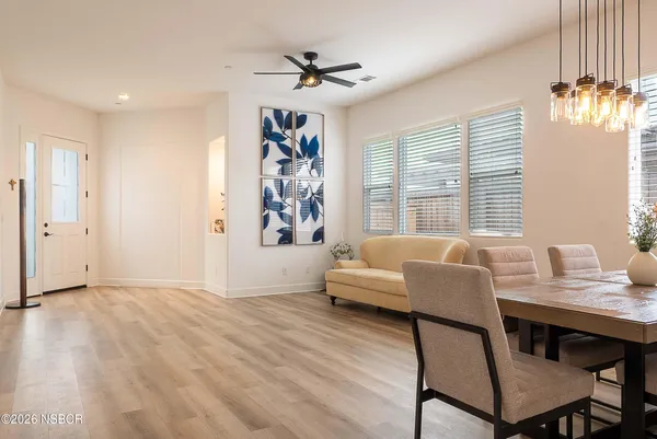 a workspace with furniture and window